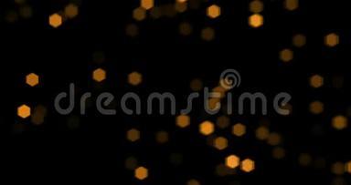 圣诞节金色的微粒闪耀着黑色背景上流淌的金色节日新年快乐